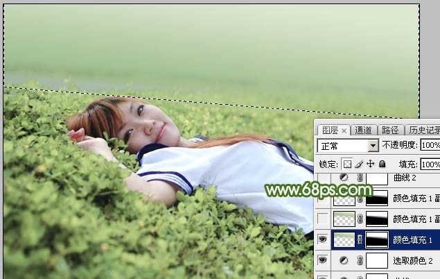 ‘Photoshop将草地上的美女图片增加唯美的春季粉绿色‘