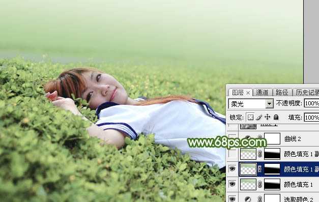 ‘Photoshop将草地上的美女图片增加唯美的春季粉绿色‘