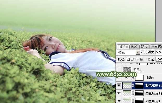 ‘Photoshop将草地上的美女图片增加唯美的春季粉绿色‘