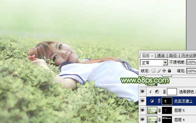 ‘Photoshop将草地上的美女图片增加唯美的春季粉绿色‘