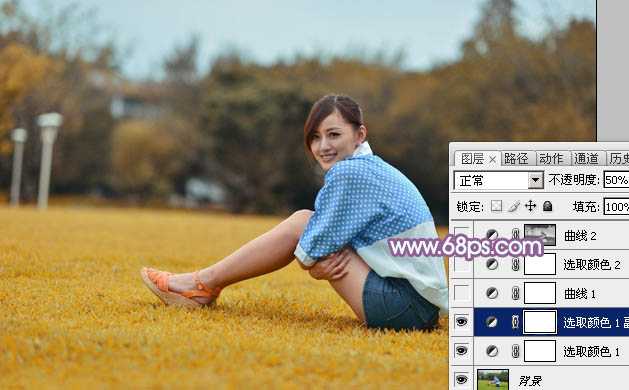 ‘Photoshop将草地上的美女打造甜美的淡调蓝黄色‘