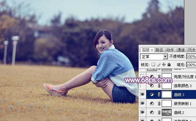 ‘Photoshop将草地上的美女打造甜美的淡调蓝黄色‘