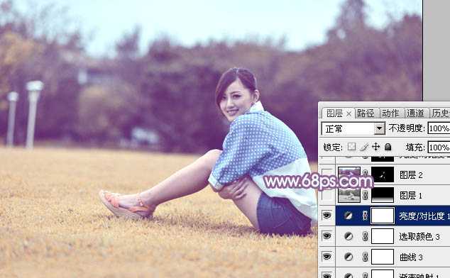 ‘Photoshop将草地上的美女打造甜美的淡调蓝黄色‘