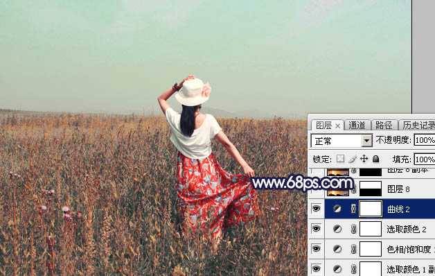 ‘Photoshop将草原人物图片增加大气的霞光效果‘