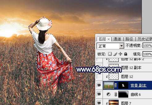 ‘Photoshop将草原人物图片增加大气的霞光效果‘