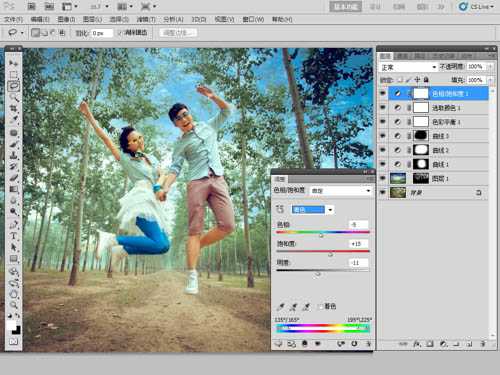 ‘Photoshop将泛白的树林人物图片调制出蓝色天空效果‘