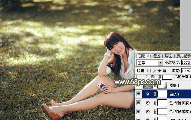 ‘Photoshop将草地美女图片打造出唯美的阳光褐色‘