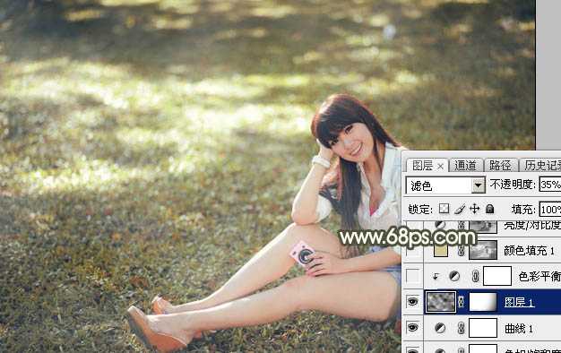 ‘Photoshop将草地美女图片打造出唯美的阳光褐色‘
