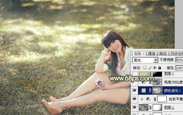 ‘Photoshop将草地美女图片打造出唯美的阳光褐色‘