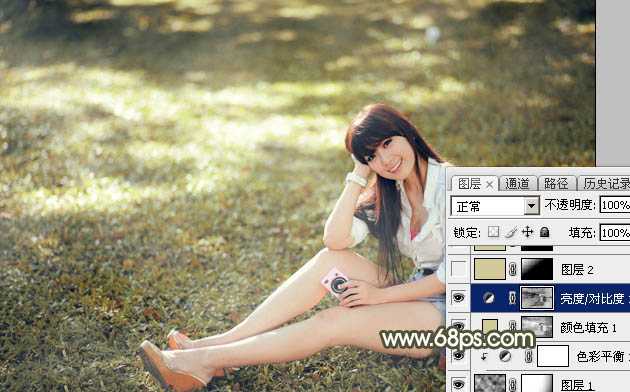 ‘Photoshop将草地美女图片打造出唯美的阳光褐色‘