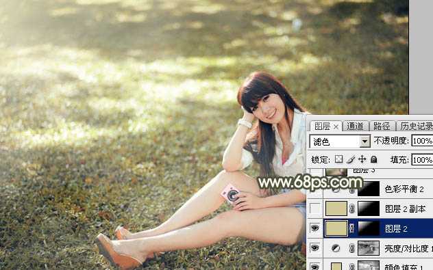 ‘Photoshop将草地美女图片打造出唯美的阳光褐色‘