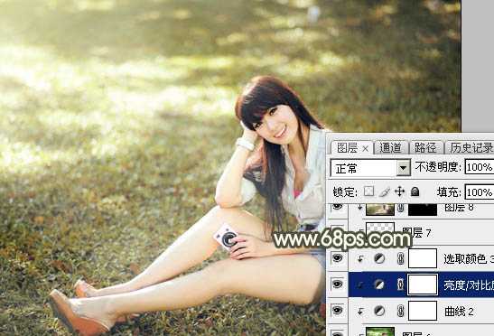 ‘Photoshop将草地美女图片打造出唯美的阳光褐色‘