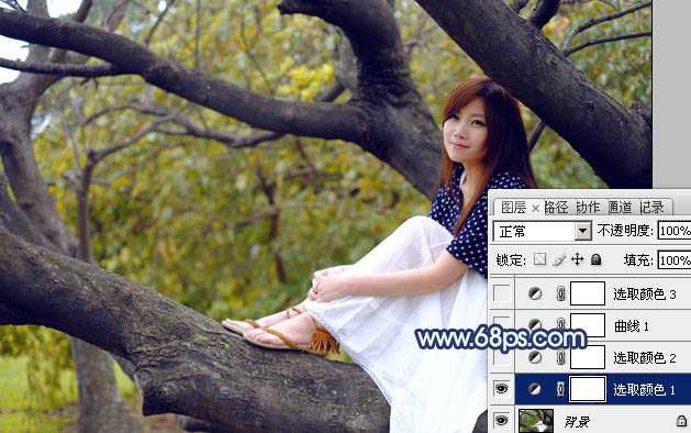 ‘Photoshop为坐树枝上的美女调制出小清新的蓝黄色‘