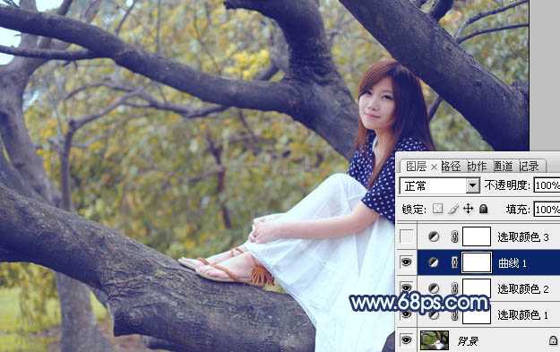 ‘Photoshop为坐树枝上的美女调制出小清新的蓝黄色‘