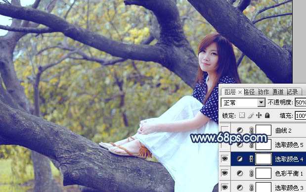 ‘Photoshop为坐树枝上的美女调制出小清新的蓝黄色‘