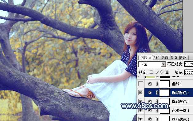 ‘Photoshop为坐树枝上的美女调制出小清新的蓝黄色‘