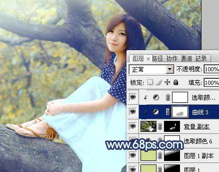 ‘Photoshop为坐树枝上的美女调制出小清新的蓝黄色‘