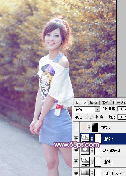 ‘Photoshop为绿叶边的美女加上梦幻的红褐色‘