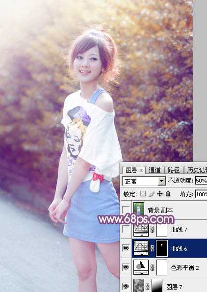 ‘Photoshop为绿叶边的美女加上梦幻的红褐色‘