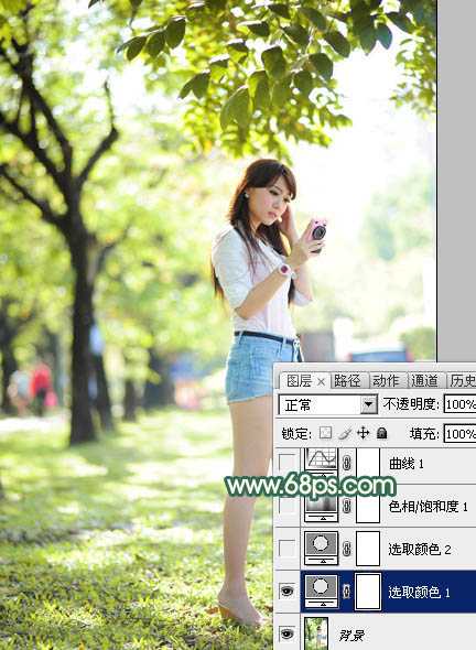 ‘Photoshop将树边美女调出甜美的秋季橙红色‘