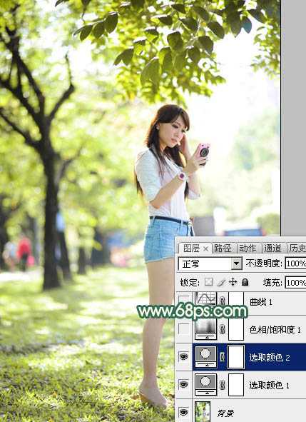 ‘Photoshop将树边美女调出甜美的秋季橙红色‘