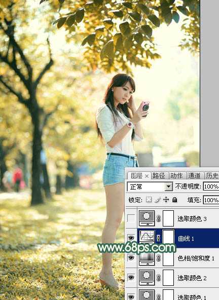 ‘Photoshop将树边美女调出甜美的秋季橙红色‘