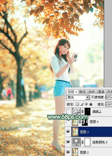 ‘Photoshop将树边美女调出甜美的秋季橙红色‘