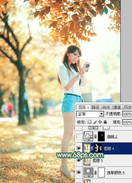 ‘Photoshop将树边美女调出甜美的秋季橙红色‘