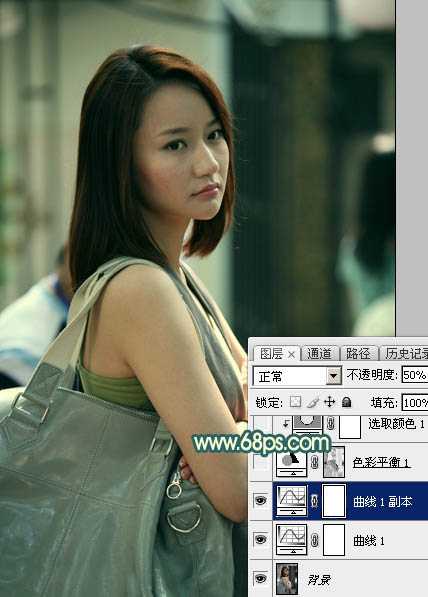‘Photoshop将街道人物图片调制出暖色逆光效果‘