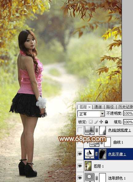 ‘Photoshop给绿树中的人物加上唯美的秋季橙绿色‘