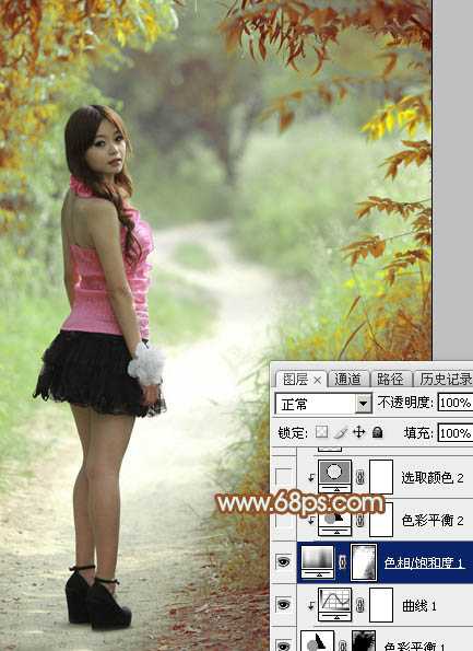 ‘Photoshop给绿树中的人物加上唯美的秋季橙绿色‘