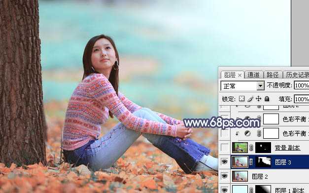 ‘Photoshop打造甜美的青红色秋季外景美女图片‘