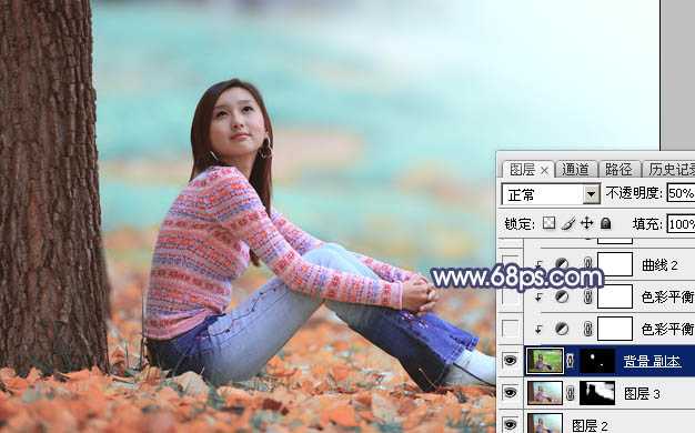 ‘Photoshop打造甜美的青红色秋季外景美女图片‘