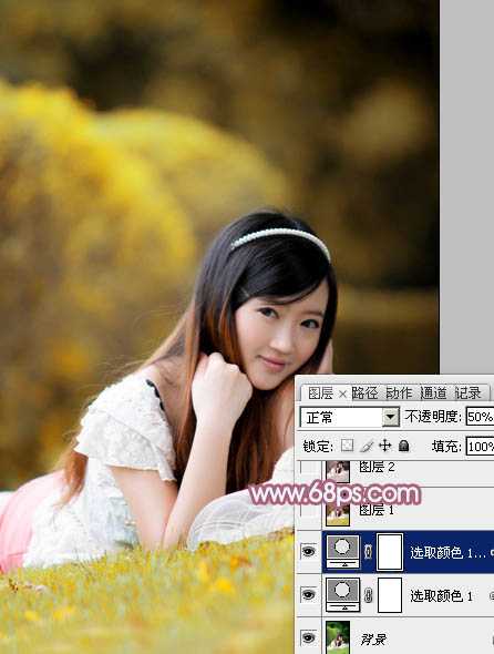 ‘Photoshop将趴在草地上的美女图片增加小清新的粉红色‘