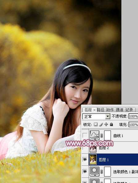 ‘Photoshop将趴在草地上的美女图片增加小清新的粉红色‘