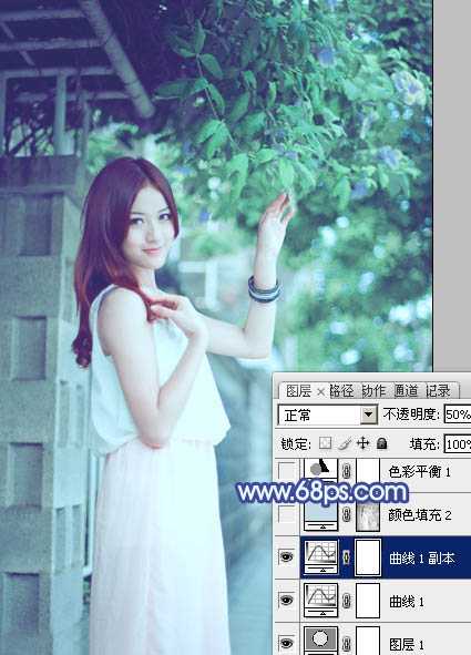 ‘Photoshop将外景美女调出柔美的冷艳青蓝色‘