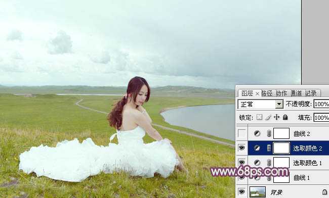 ‘Photoshop将草原人物图片调制出小清新的黄蓝色‘