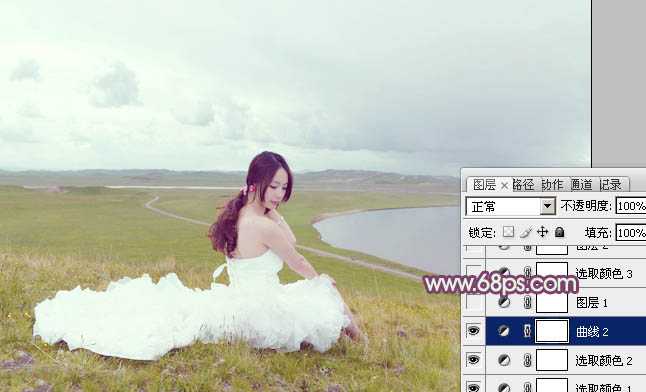 ‘Photoshop将草原人物图片调制出小清新的黄蓝色‘