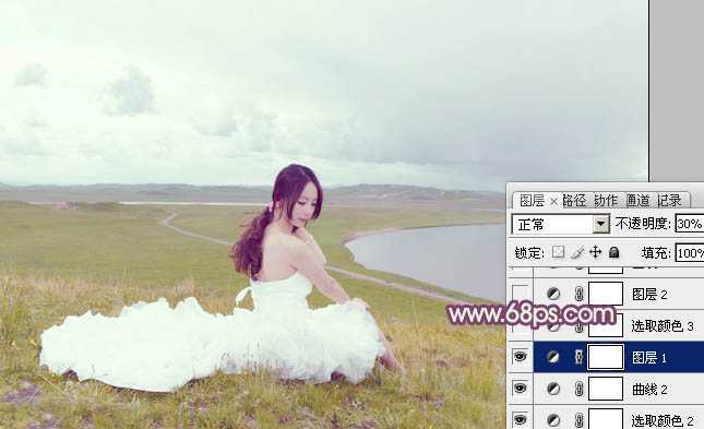 ‘Photoshop将草原人物图片调制出小清新的黄蓝色‘