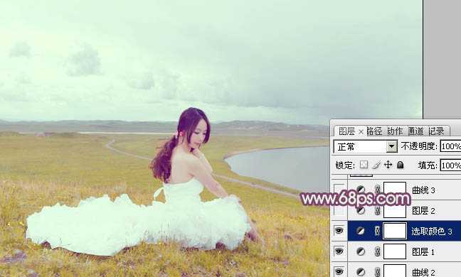 ‘Photoshop将草原人物图片调制出小清新的黄蓝色‘