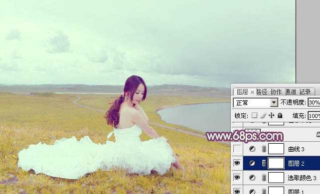 ‘Photoshop将草原人物图片调制出小清新的黄蓝色‘