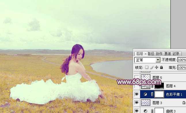 ‘Photoshop将草原人物图片调制出小清新的黄蓝色‘