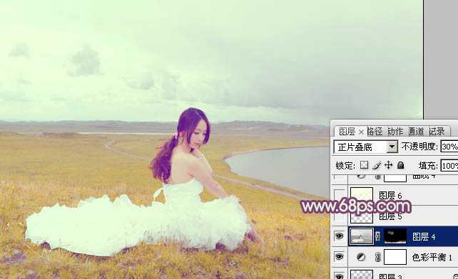 ‘Photoshop将草原人物图片调制出小清新的黄蓝色‘