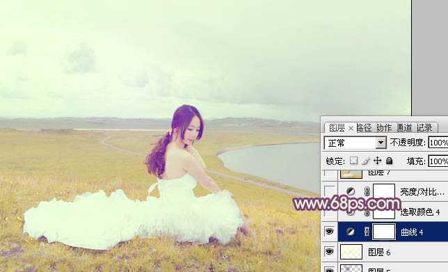 ‘Photoshop将草原人物图片调制出小清新的黄蓝色‘