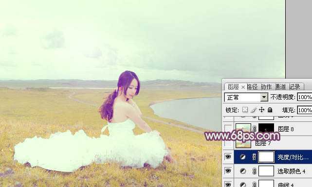 ‘Photoshop将草原人物图片调制出小清新的黄蓝色‘