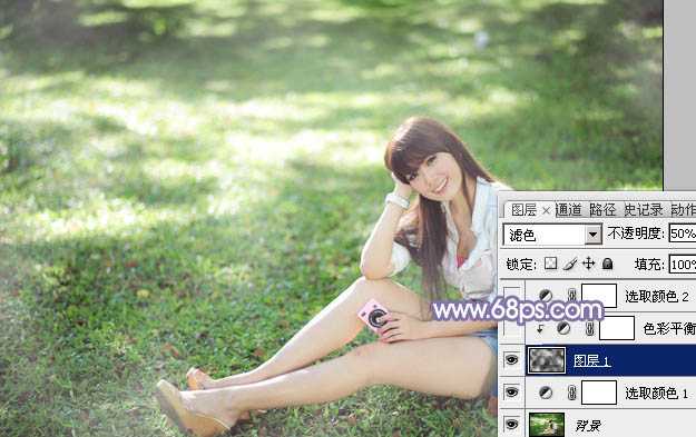 ‘Photoshop为绿草中的美女加上梦幻的青蓝色‘
