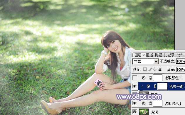 ‘Photoshop为绿草中的美女加上梦幻的青蓝色‘