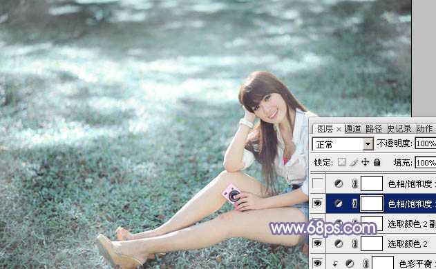 ‘Photoshop为绿草中的美女加上梦幻的青蓝色‘