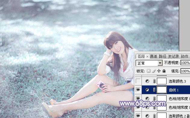 ‘Photoshop为绿草中的美女加上梦幻的青蓝色‘