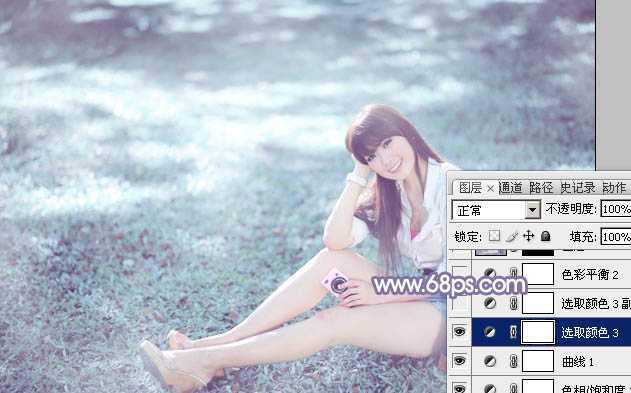 ‘Photoshop为绿草中的美女加上梦幻的青蓝色‘